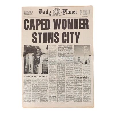 Lot #811 - SUPERMAN (1978) - Daily Planet "Caped Wonder Stuns City" Newspaper