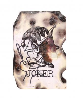 Lot #95 - THE DARK KNIGHT (2008) - Scorched Joker Card Autographed by Heath Ledger