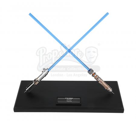 Lot #771 - STAR WARS: THE RISE OF SKYWALKER (2019) - Head of Department Crossed Lightsaber Crew Gift