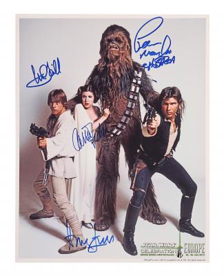 Lot #936 - STAR WARS: A NEW HOPE (1977) - Harrison Ford, Mark Hamill, Carrie Fisher and Peter Mayhew Autographed Photo