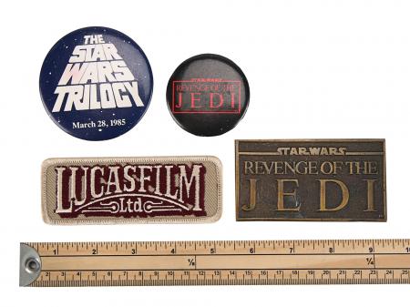 Lot #933 - STAR WARS: ORIGINAL TRILOGY (1977-1983) - Brass Paperweight Crew Gift, Lucasfilm Ltd Embroidered Patch and Badges - 6